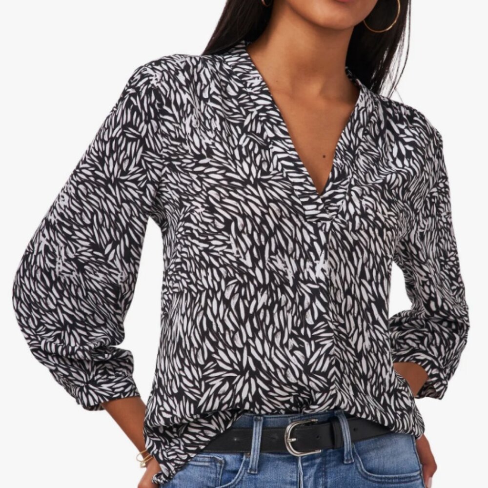 Versatile and stylish blouse easily transitions from work to play.